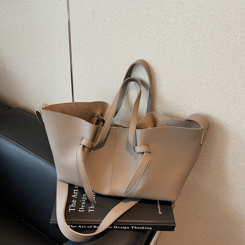 Gray minimal crossbody bag for women with adjustable strap