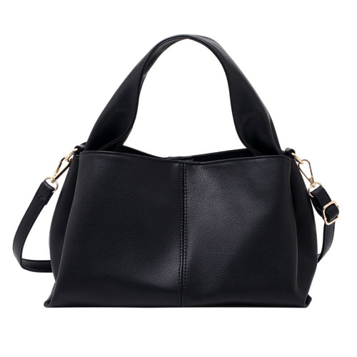 Medium Everyday Shoulder Bag in sleek black faux leather with structured silhouette and adjustable strap.