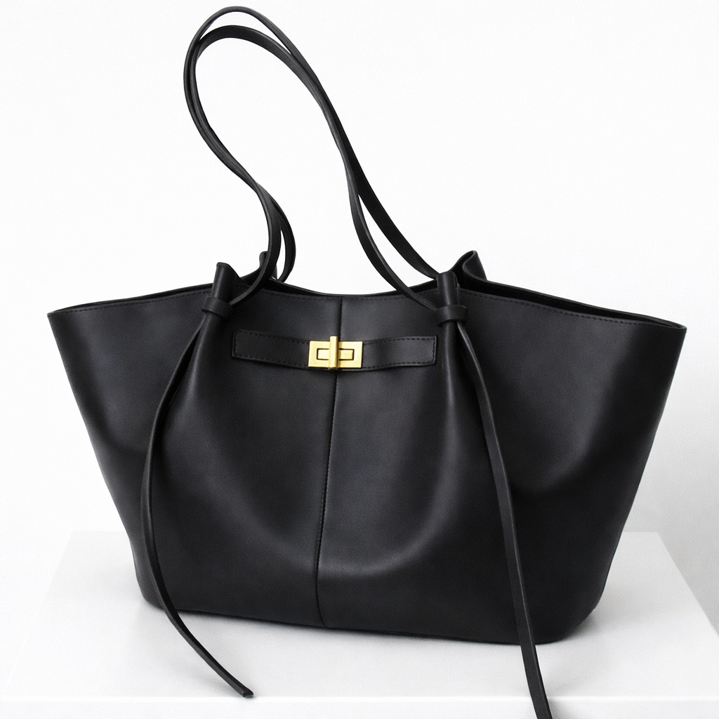 Mila Long Strap Tote Bag in black leather with structured silhouette and long shoulder straps.
