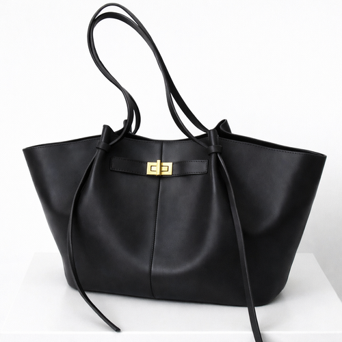 Mila Long Strap Tote Bag in black leather with structured silhouette and long shoulder straps.