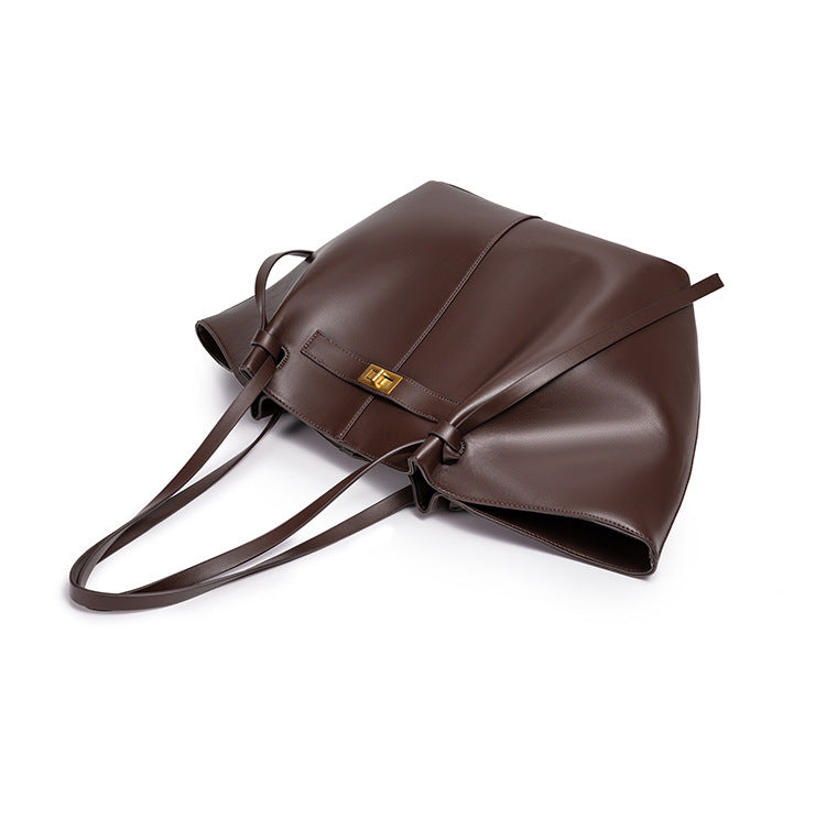 Mila Long Strap Tote Bag in brown leather with long shoulder straps and structured silhouette.