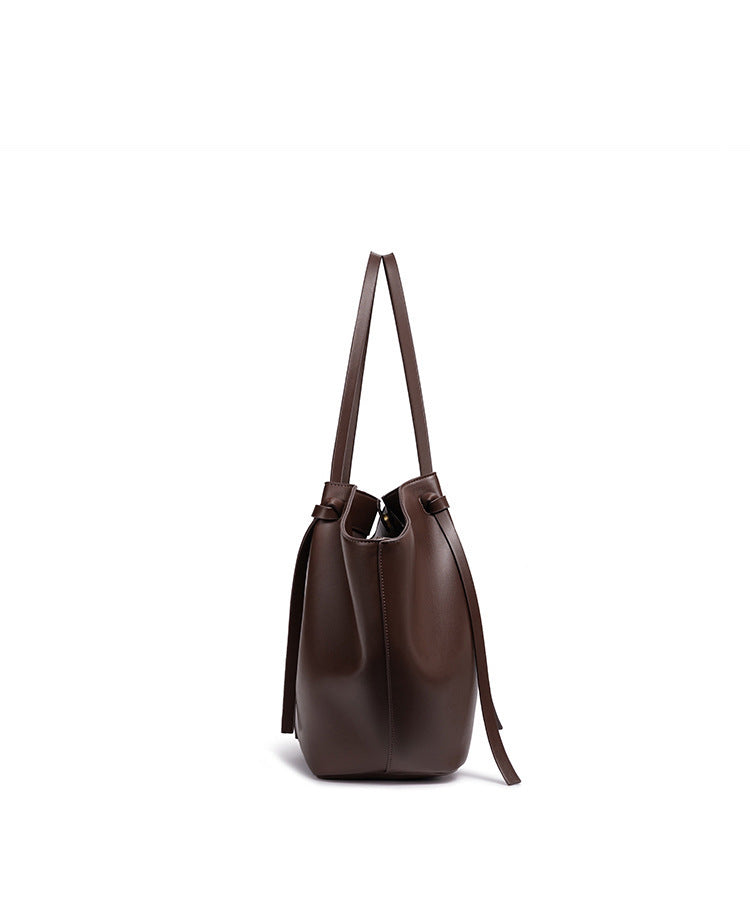 Mila Long Strap Tote Bag in brown with long straps, showcasing its structured silhouette and elegant design.